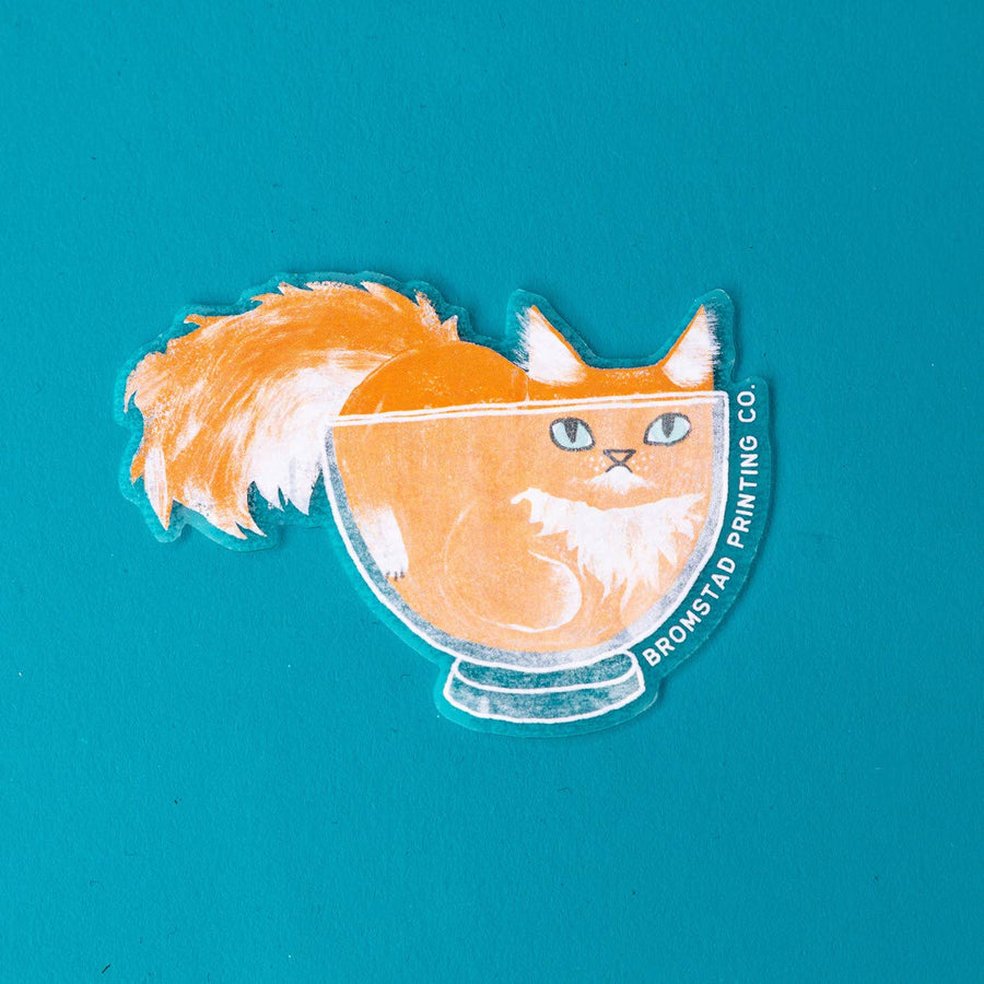 Orange Cat In A Clear Bowl Sticker